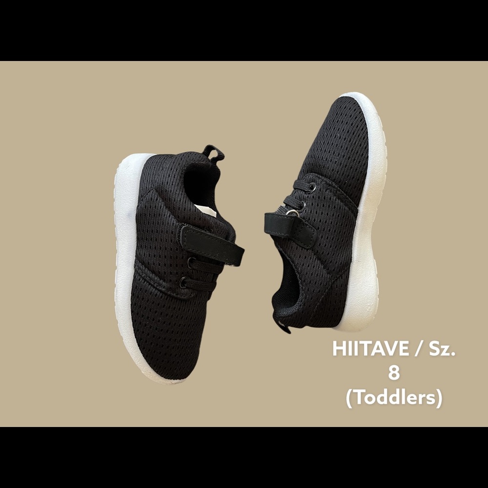 Never used black / white toddler shoes.